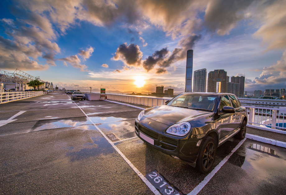 rooftop parking lot with puddles after rain